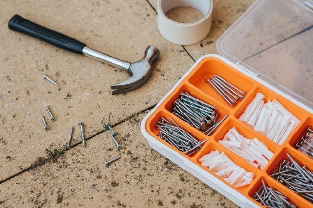 maintenance tools on a wooden surface